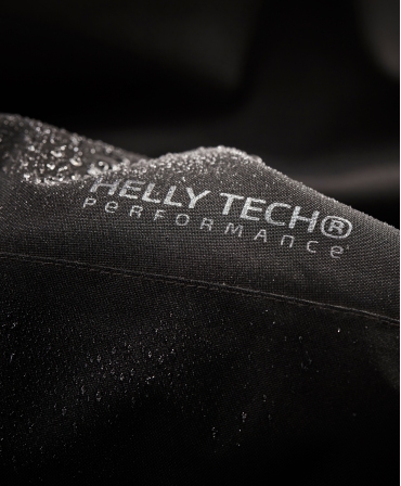 Geaca de iarna cu gluga Helly Hansen Chelsea Evolution Winter, impermeabila, neagra, tehnologie Helly Tech